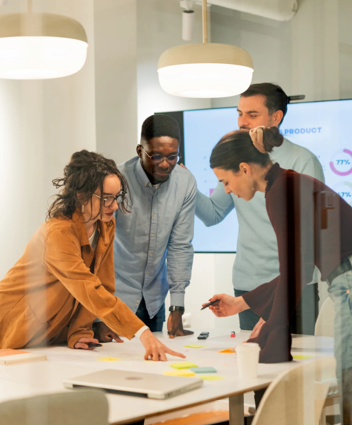 Team collaborating in a modern office setting.