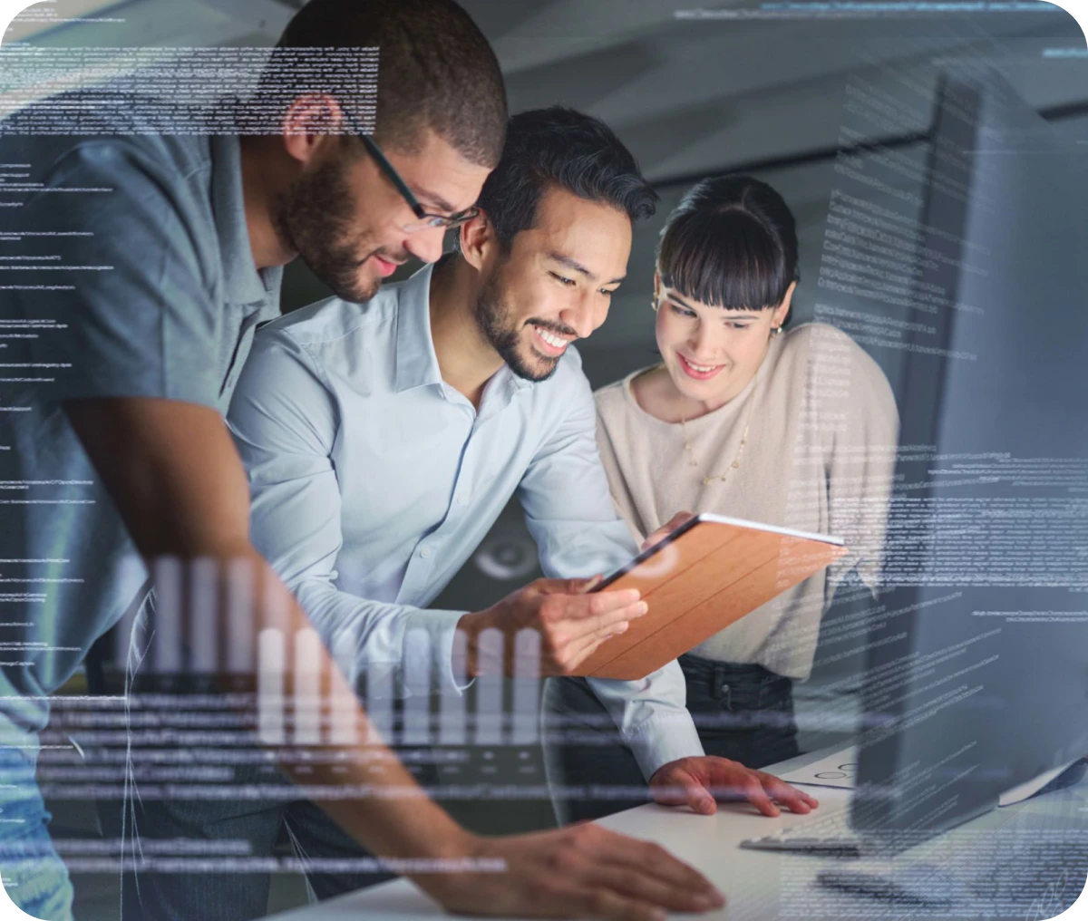 Team collaborating in front of a computer.