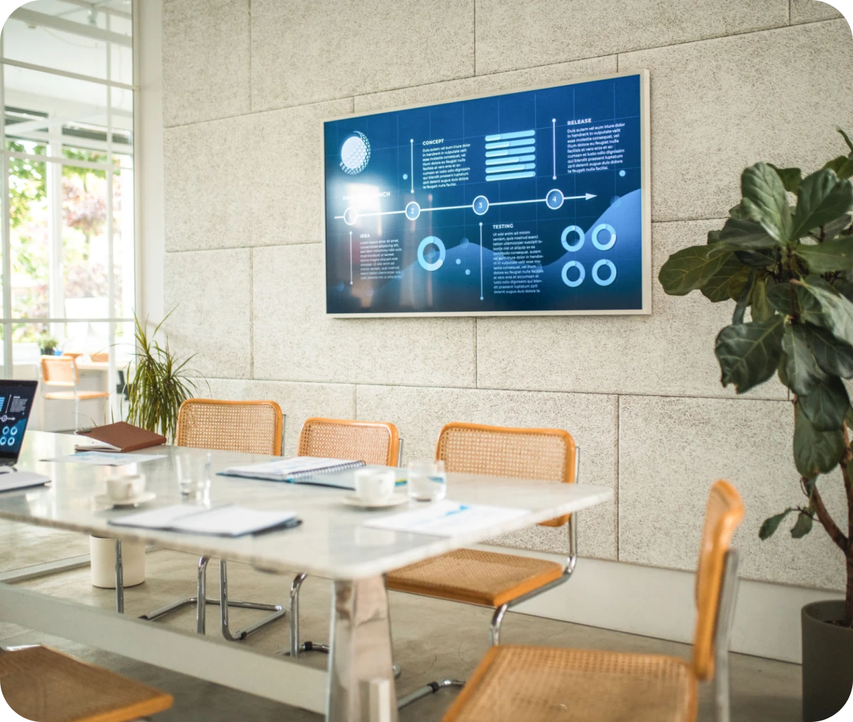 Modern conference room with presentation screen.